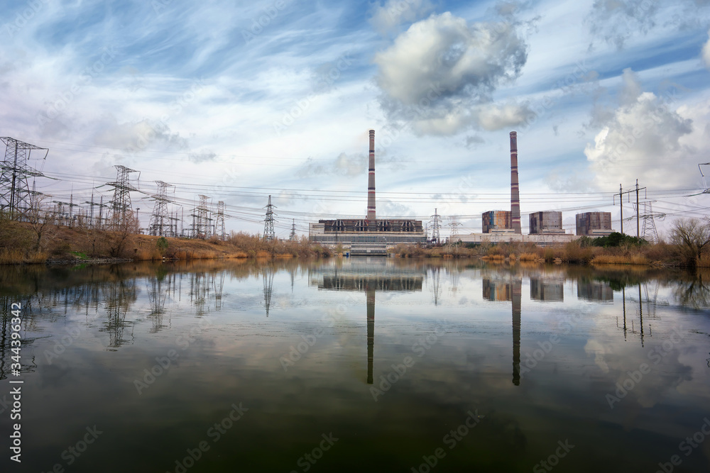 Industrial thermal power plant with smokestack