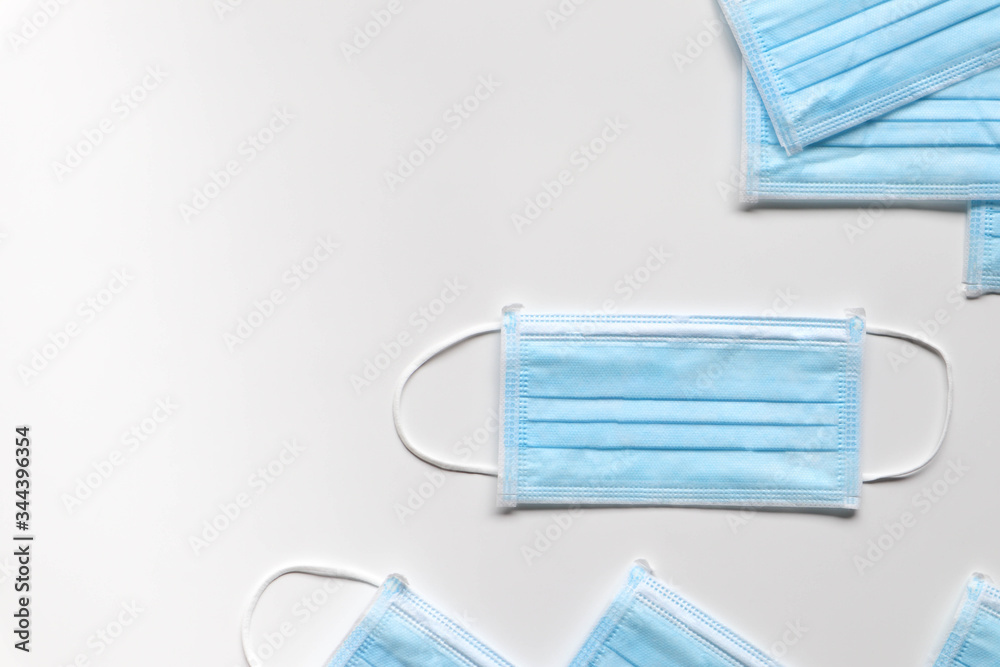 blue face masks on white background blue face masks on white background