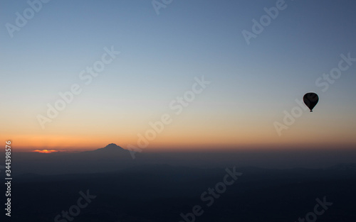 Hot Air balloon flying in Turkey Goreme Capadocia sky sunset sunrise