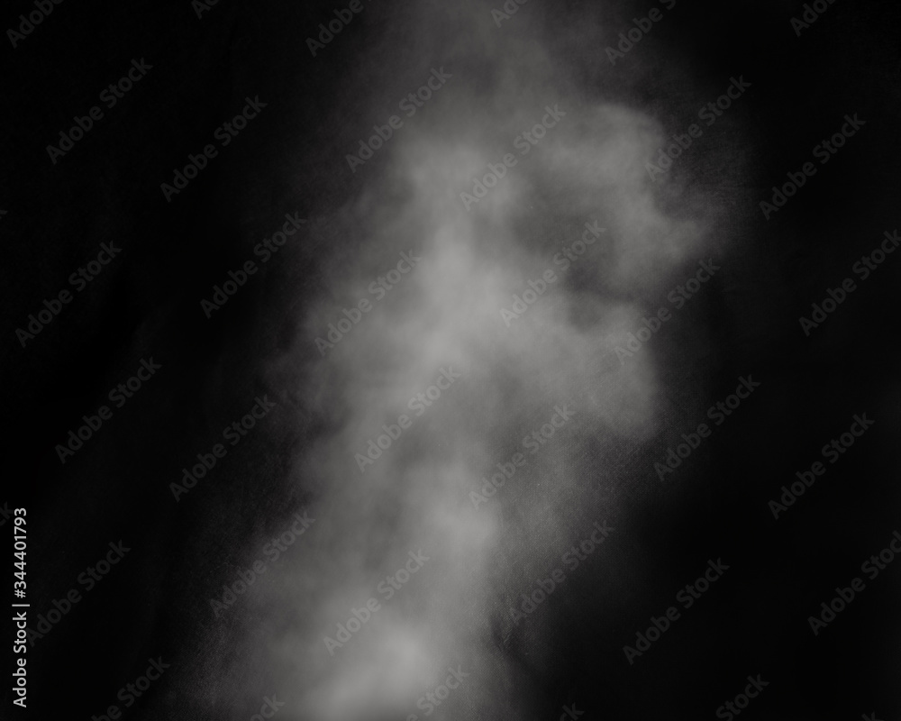 White smoke isolated on black background. smoke stock image