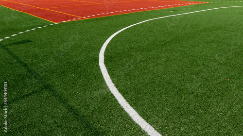 synthetic sports field for football, volleyball, tennis and leisure