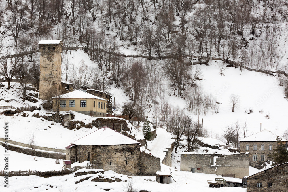 custom made wallpaper toronto digitalOld stone house and tower in cold winter in Caucasus Mountains. Mestia, Svaneti, Georgia,  Caucasus, Europe