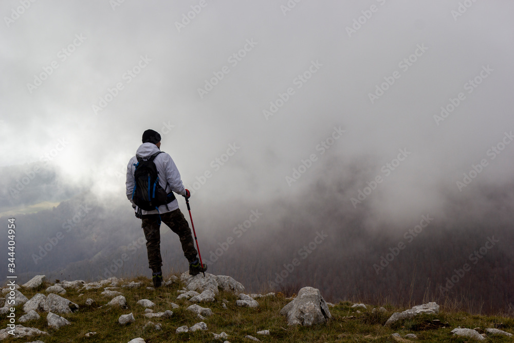 hiker on the top of a mountain