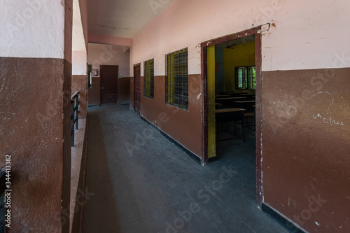 Empty corridor and classroom entry door of school in India