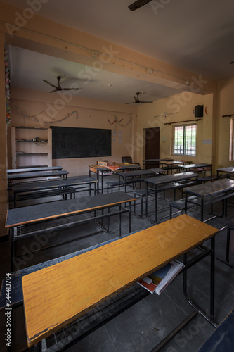 Empty classroom with desks in Indian school