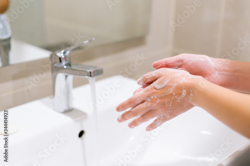 Washing hands rubbing with soap for corona virus prevention, hygiene to stop spreading coronavirus.