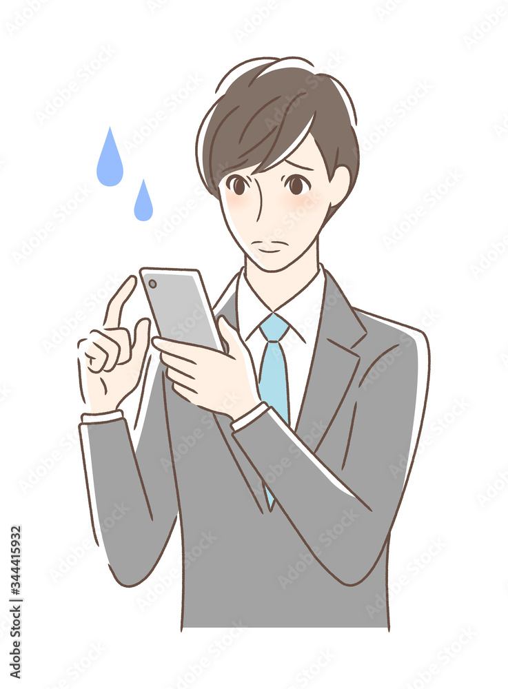 スマホを操作して不安な男性 スマホを操作して不安な男性