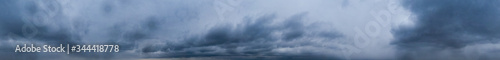 Panorama of cloudy gray sky. Sky rainstorm photo