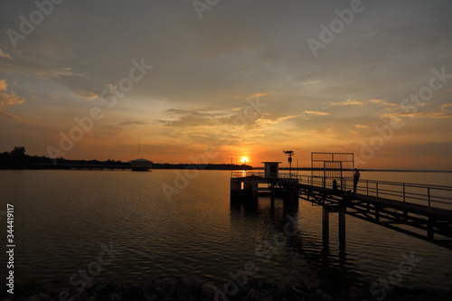 Dokkrai Reservoir and view sunset water reflection at rayong, thailand 
