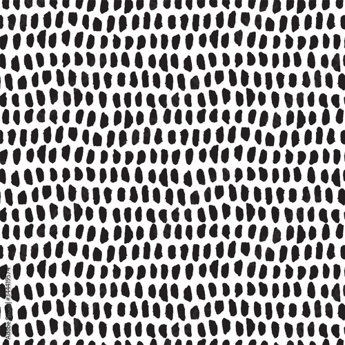 Small black hand drawn texture vector abstract seamless geometrical pattern on white background for fabric, wallpaper, scrapbooking projects or backgrounds.