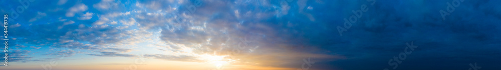 Natural background of the colorful panorama sky. Beautiful cloud in the sunrise sky background. Sky banners background.
