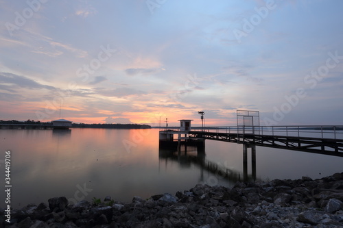 Dokkrai Reservoir and view sunset water reflection at rayong, thailand 
