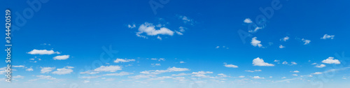 Blue Sky background with tiny Clouds. Panorama background