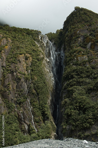 Waterfall at Franz Josef Glacier Walk in Westland Tai Poutini National Park,West Coast on South Island of New Zealand 
