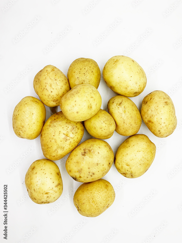 Fresh potatoes isolated on white background