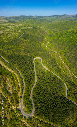 Aerial view from drone to the road through mountain © niki spasov