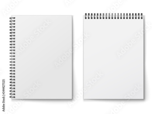 Blank closed realistic spiral notepad mockup isolated on white background.