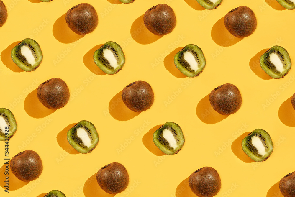 Kiwi fruit in diagonal row as pattern. Kiwi fruit in diagonal row as pattern.