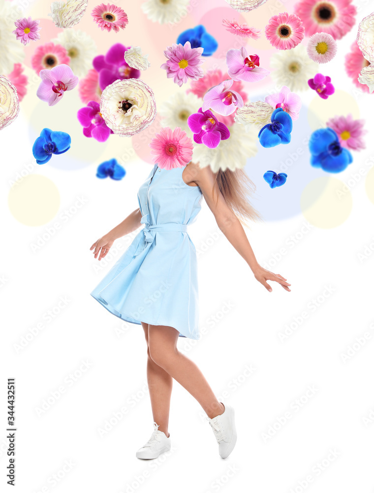 Creative spring fashion composition. Dancing girl and flowers splash Creative spring fashion composition. Dancing girl and flowers splash