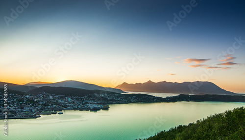colorful sunset in norway during summer with clouds