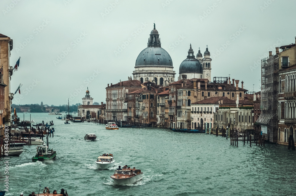 View from the bridge to the Grand Canal and historic buildings of Venice.