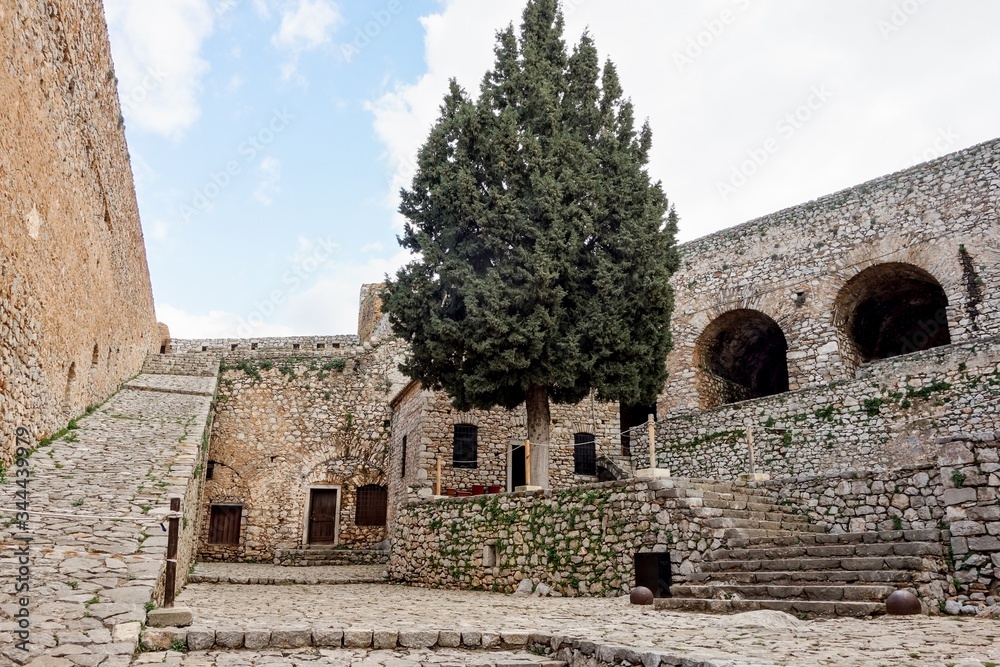 Courtyard and stone staircase inside the Palamidi Castle in Nafplio, Greece, Europe