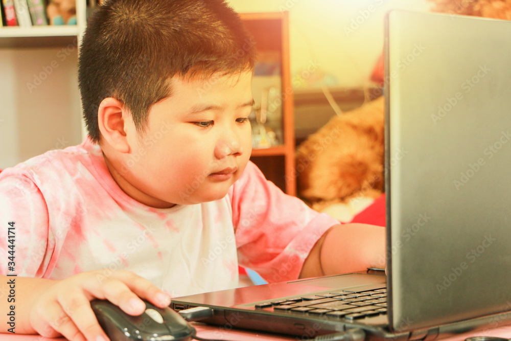 Boys wear headphones, play computer games, stay at home. Boys wear headphones, play computer games, stay at home.