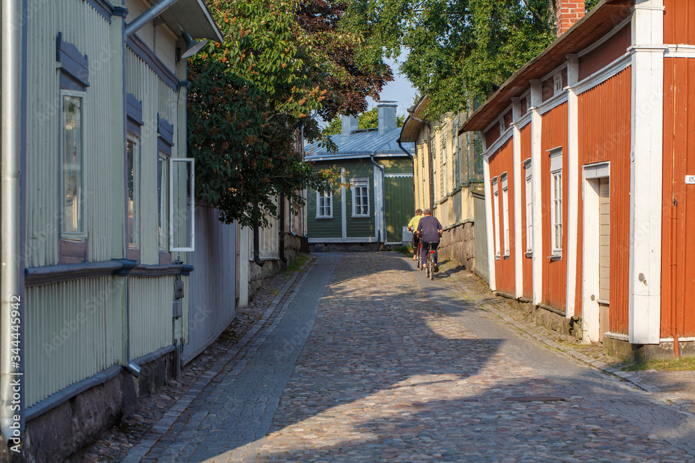 Fototapeta premium Cyclists in Old Rauma 