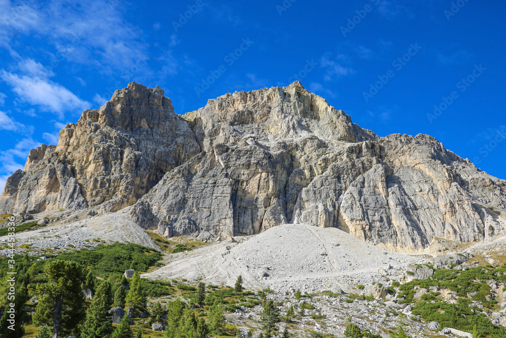Beautiful summer landscape, fantastic alpine pass and high mountains, Dolomites, Italy, Europe. Selective focus.