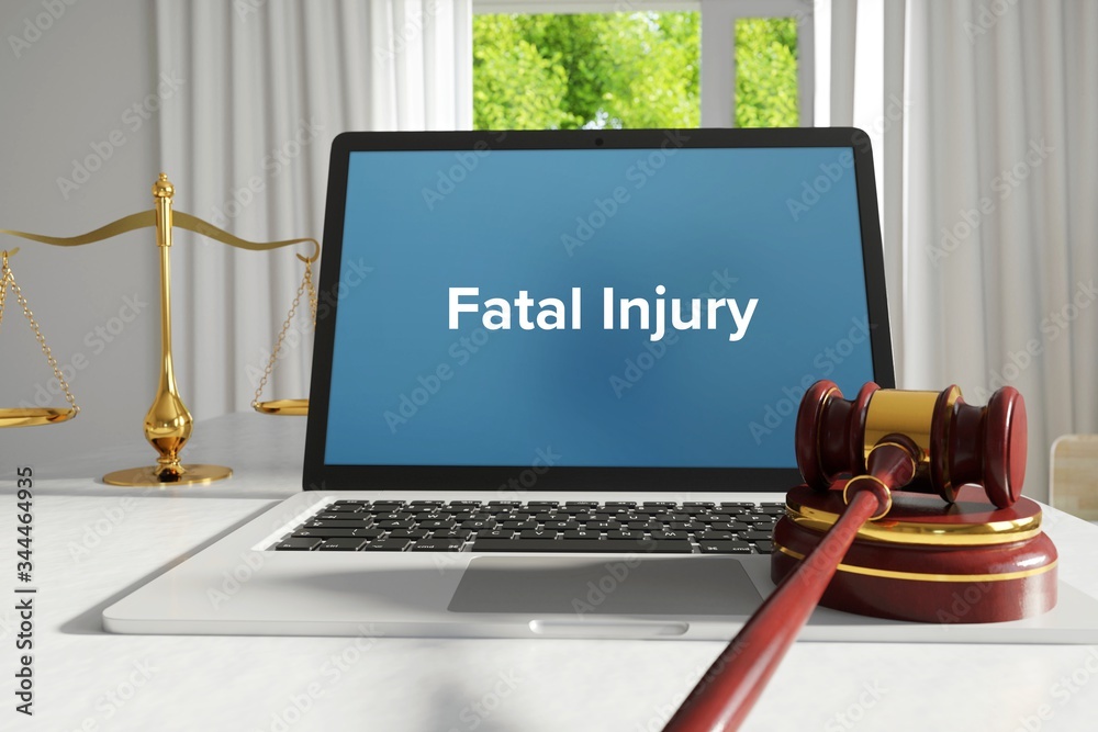 Fototapeta premium Fatal Injury – Law, Judgment, Web. Laptop in the office with term on the screen. Hammer, Libra, Lawyer.