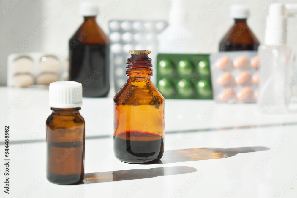 Medical laboratory, various drugs in jars on a white background. Medical laboratory, various drugs in jars on a white background.