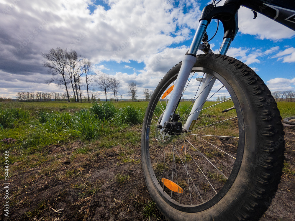 Naklejka premium Bicycle trip on rural roads