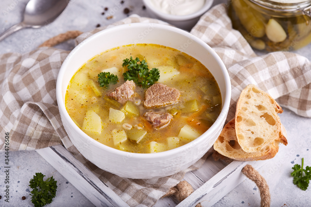 Traditional Russian soup Rassolnik with beef meat and pickled cucumbers Traditional Russian soup Rassolnik with beef meat and pickled cucumbers