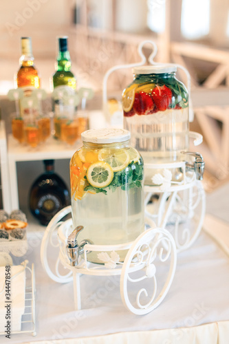 Beautiful handmade fresh lemonade bottles on a table 