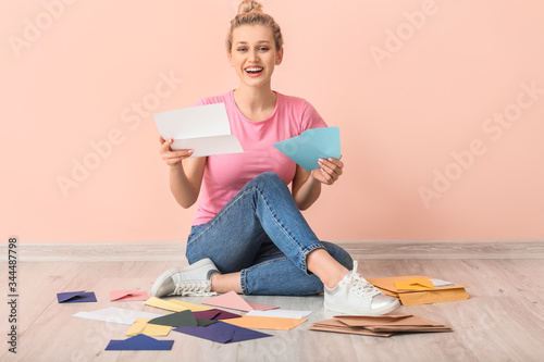 Young woman with many lette...