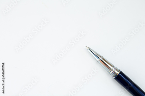 the pen lies on a white background