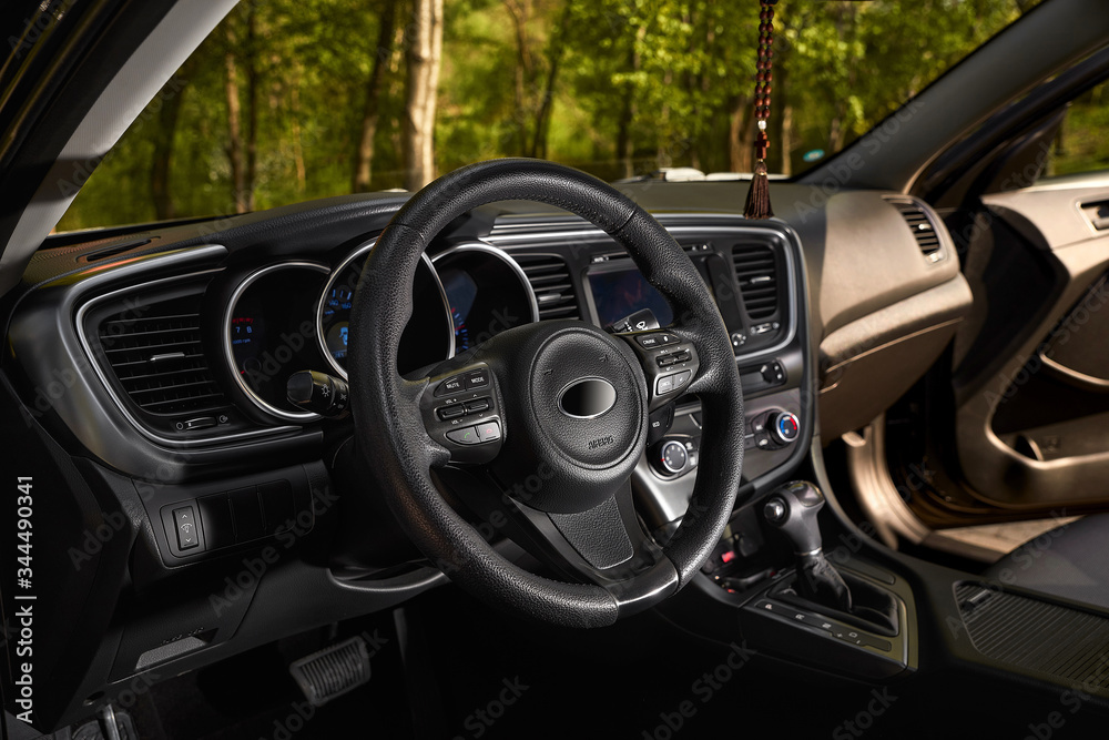 car dashboard and steering wheel, modern car interior design