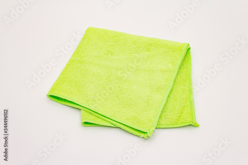 Green duster isolated on white background