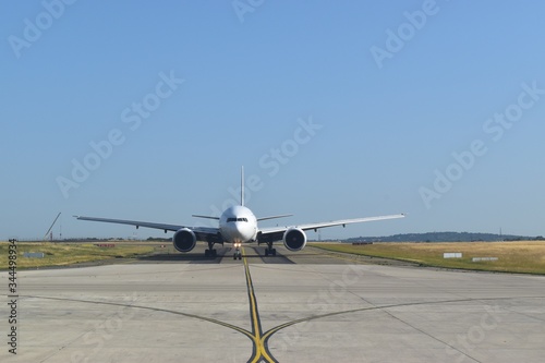 Commercial plane ready to take-off, front view. Aviation industry background.