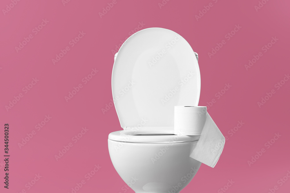 Toilet bowl with roll of paper on color background Toilet bowl with roll of paper on color background
