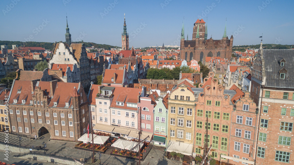 Scenic embankment of the Motlawa river with historical buildings in Gdansk