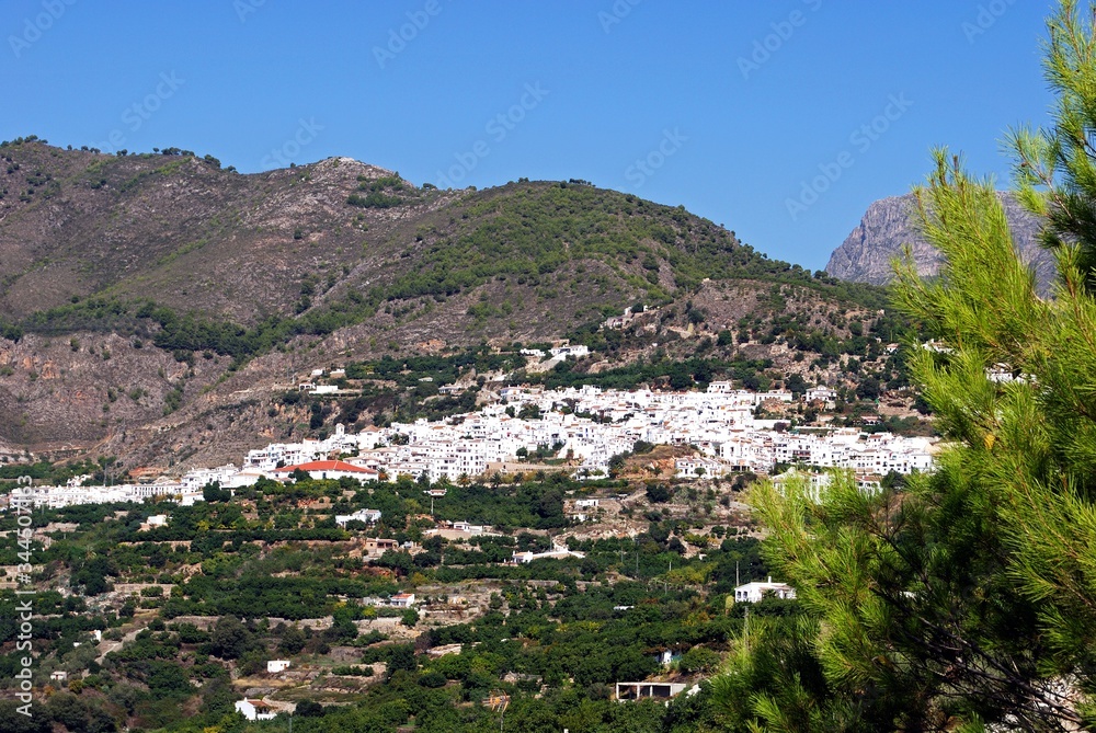 View of white village and surrounding countryside, Frigiliana, Andalusia, Spain.