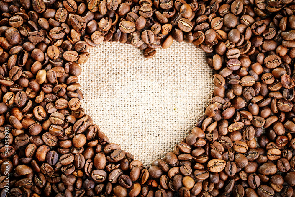 Closeup of coffee beans. Background with copy space. Horizontal. Selective focus. Closeup of coffee beans. Background with copy space. Horizontal. Selective focus.