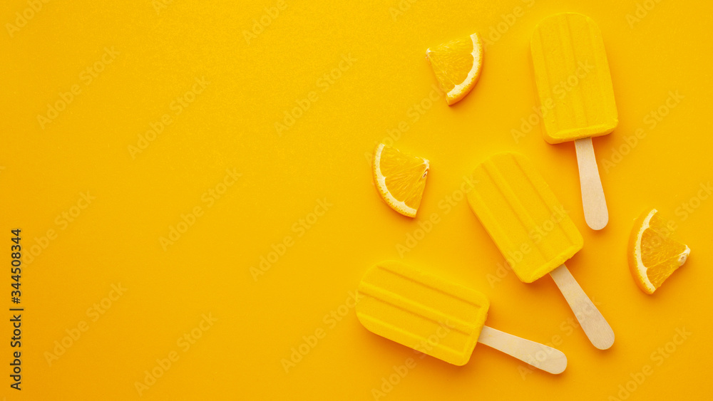 Copy-space yellow flavoured ice lollies Copy-space yellow flavoured ice lollies