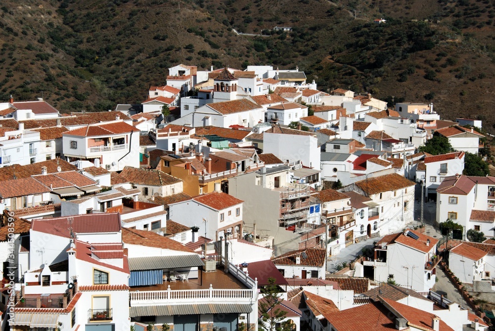 Elevated view of the whitewashed village (pueblo blanco), Moclinejo, Andalusia, Spain.