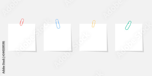Paper sticker with paperclip set with shadow isolated on grey background