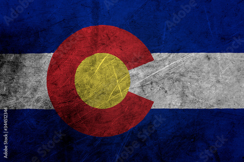 Flag of colorado, USA, on a grunge metal texture