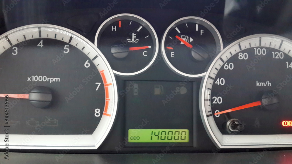 Fototapeta premium Car dashboard, tachometer, speedometer and odometer with numbers 140,000
