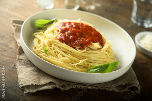 Pasta with tomato sauce and basil