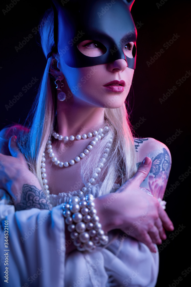 sexy girl in a rabbit mask in neon light sexy girl in a rabbit mask in neon light